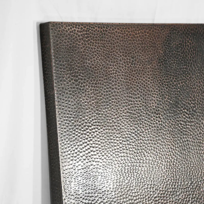 side view of dark patina Hammered copper rectangular table top with a rich, textured surface and a warm, metallic sheen