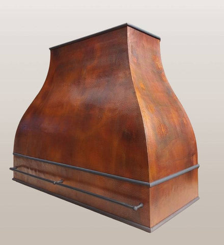 Side view of the custom hammered copper range hood ARIZONA, emphasizing its durable construction and unique design.