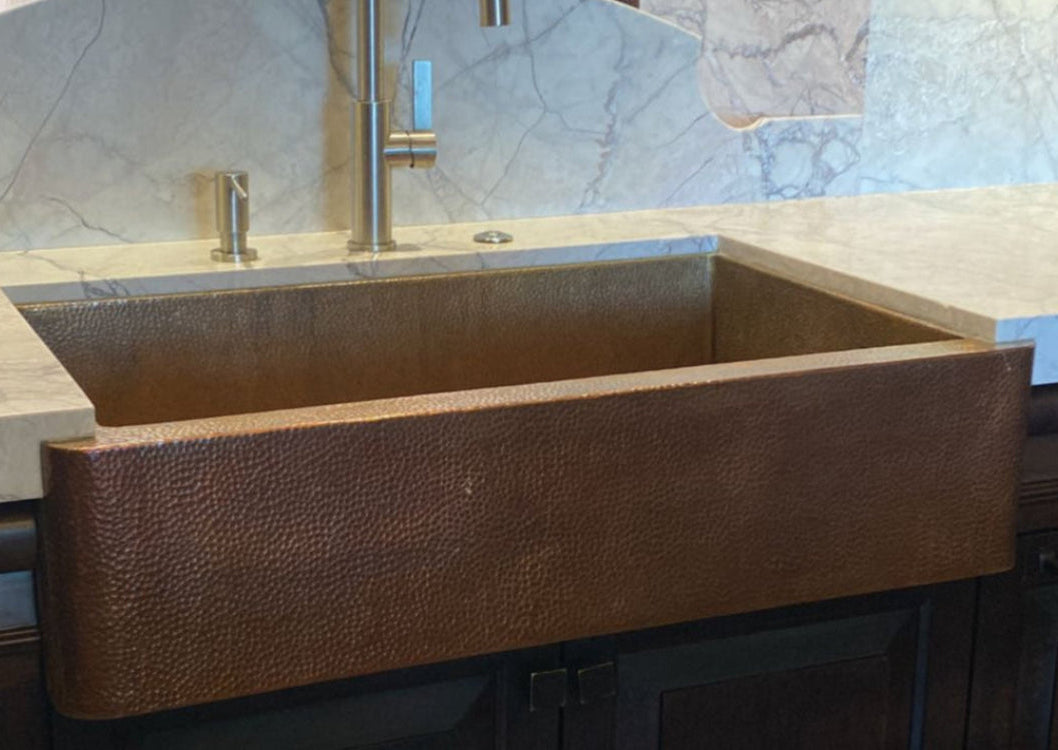 Amoretti Brothers hammered copper farmhouse drop-in sink
