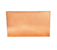 Hammered copper rectangular table top with a rich, textured surface and a warm, metallic sheen
