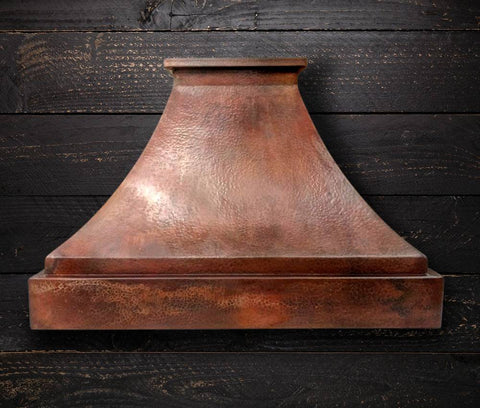 Hammered copper range hood FARMHOUSE with vintage patina, showcasing its rustic elegance and artisanal craftsmanship.