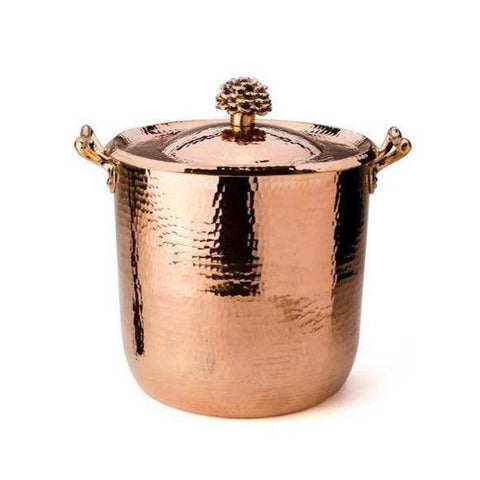 Elegant 10-quart hammered copper stock pot with a decorative flower lid, showcasing artisanal craftsmanship
