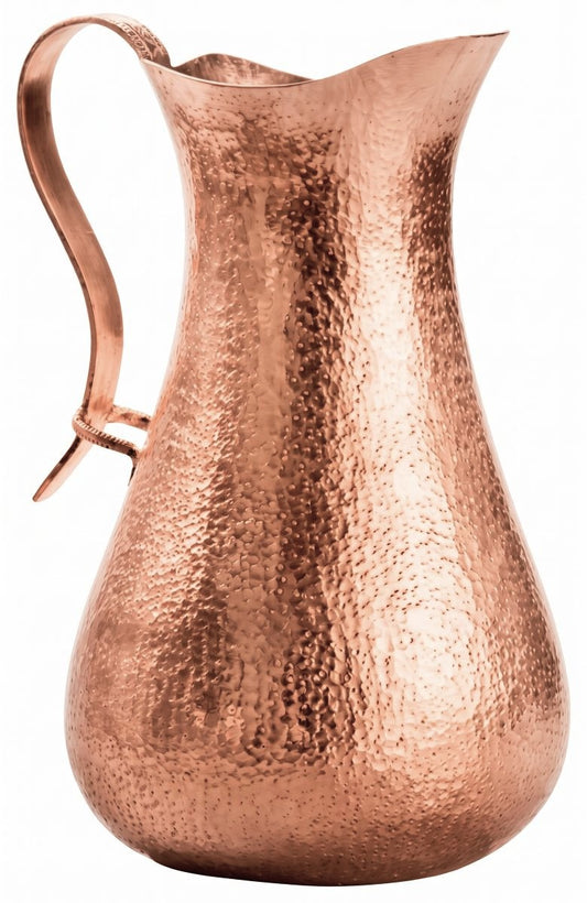 A hammered copper pitcher with a curved handle and flared spout, shown on a plain white background.