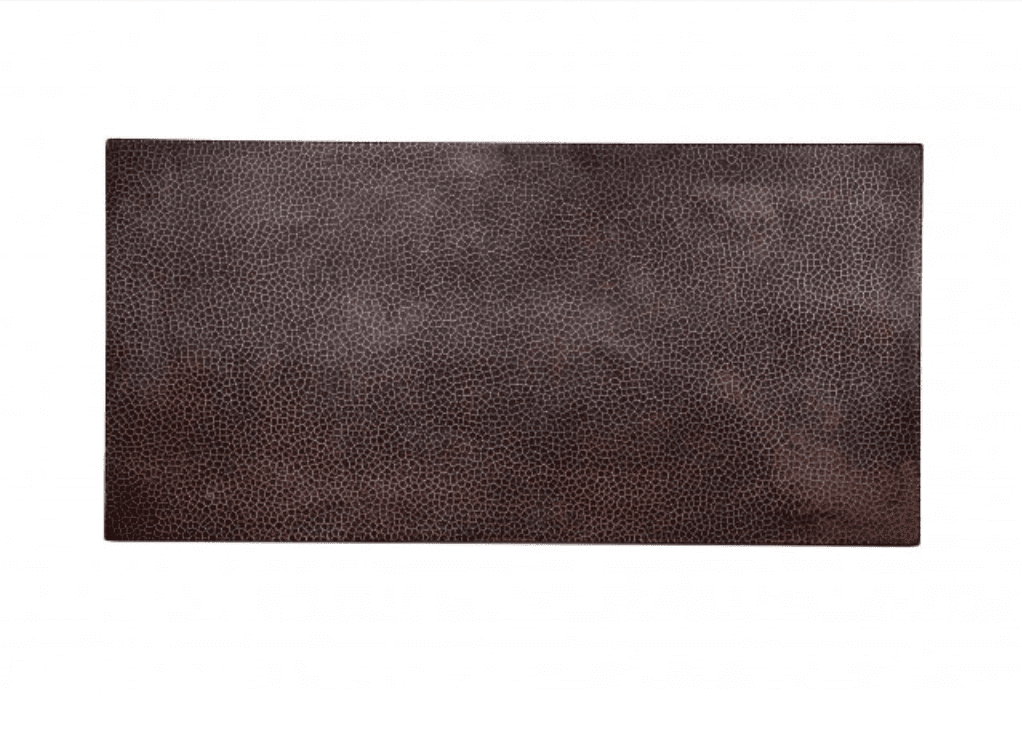 dark patina of Hammered copper rectangular table top with a rich, textured surface and a warm, metallic sheen