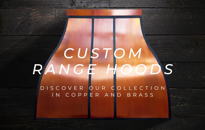 copper range hood with black straps
