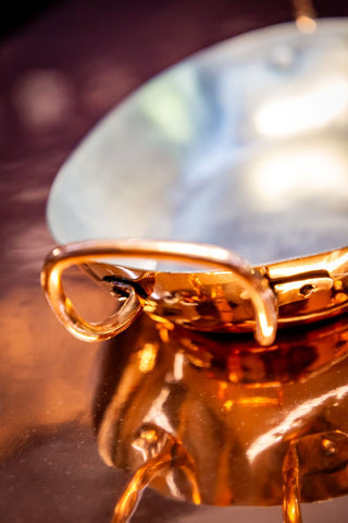 Close-up of copper oval tray by Amoretti Brothers