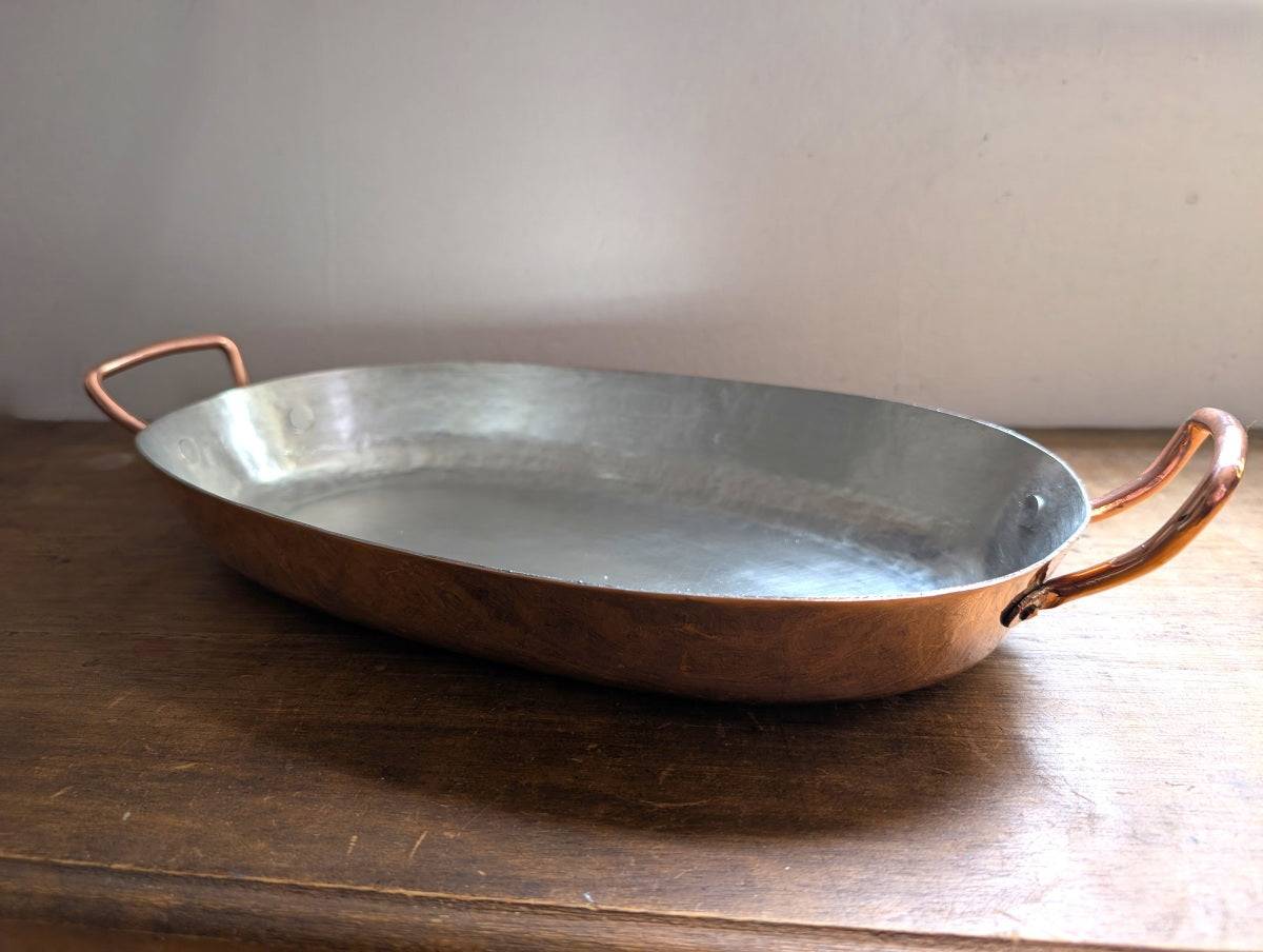 Oval copper roasting pan with tin lining and brass handles