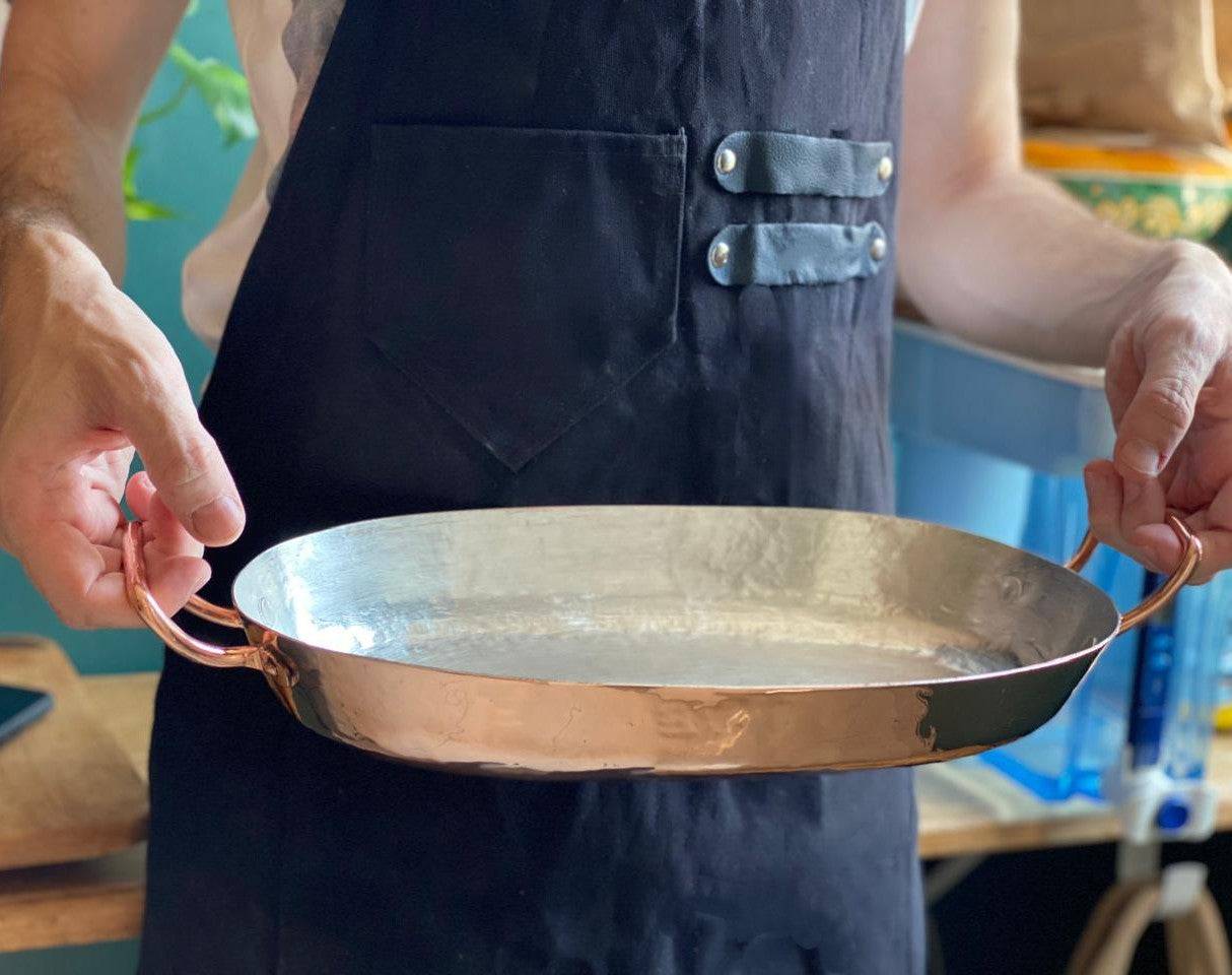 Side profile of copper roasting pan with sturdy handles