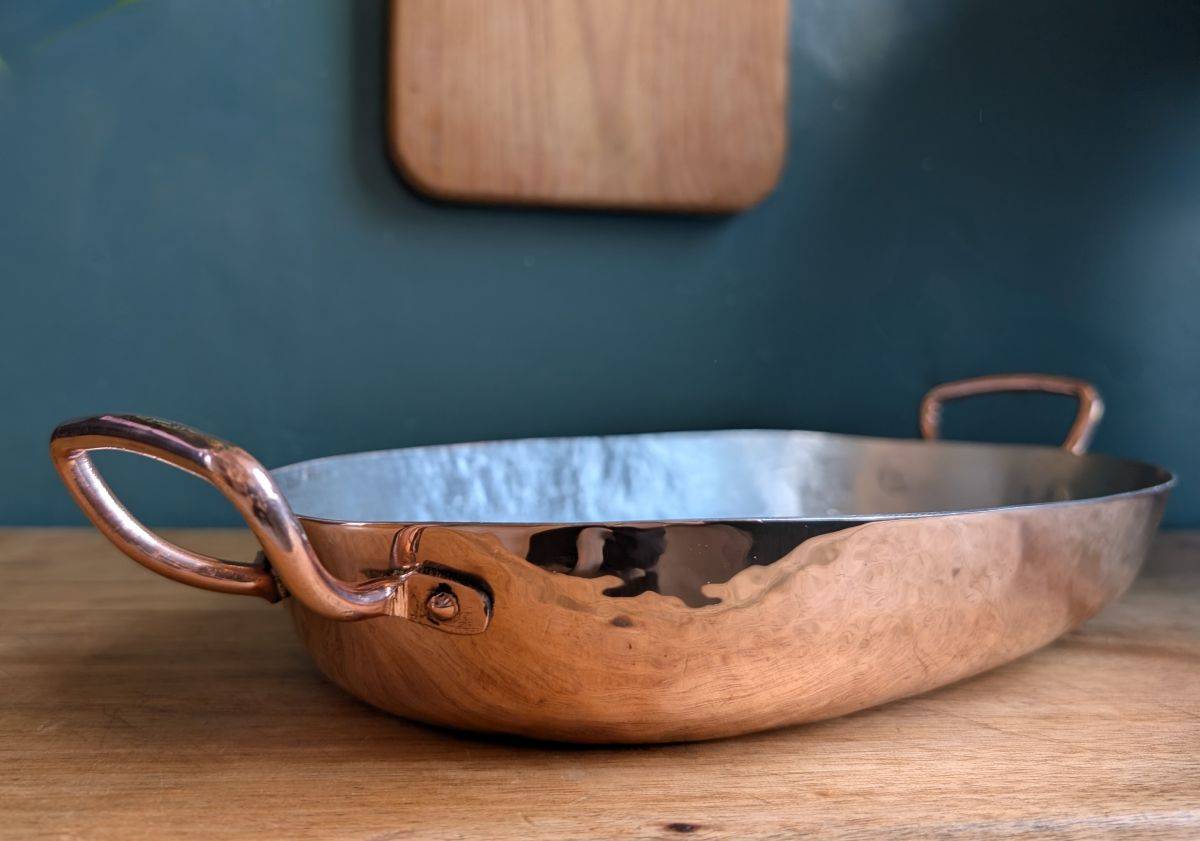 Amoretti Brothers handcrafted copper roaster pan on kitchen counter