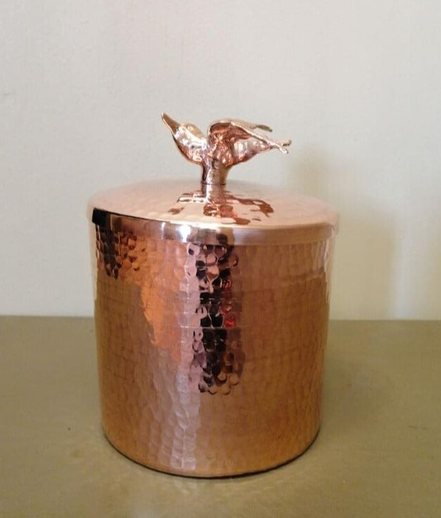 hand-hammered copper canister with bird by Amoretti Brothers