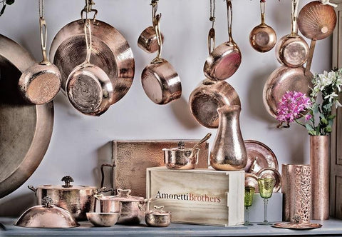 Lot - A group of graduated French copper cookware, Bridge
