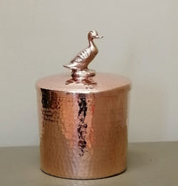 hand-hammered medium copper kitchen canister with duck by Amoretti Brothers