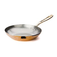 an hammered copper frying pan by amoretti brothers